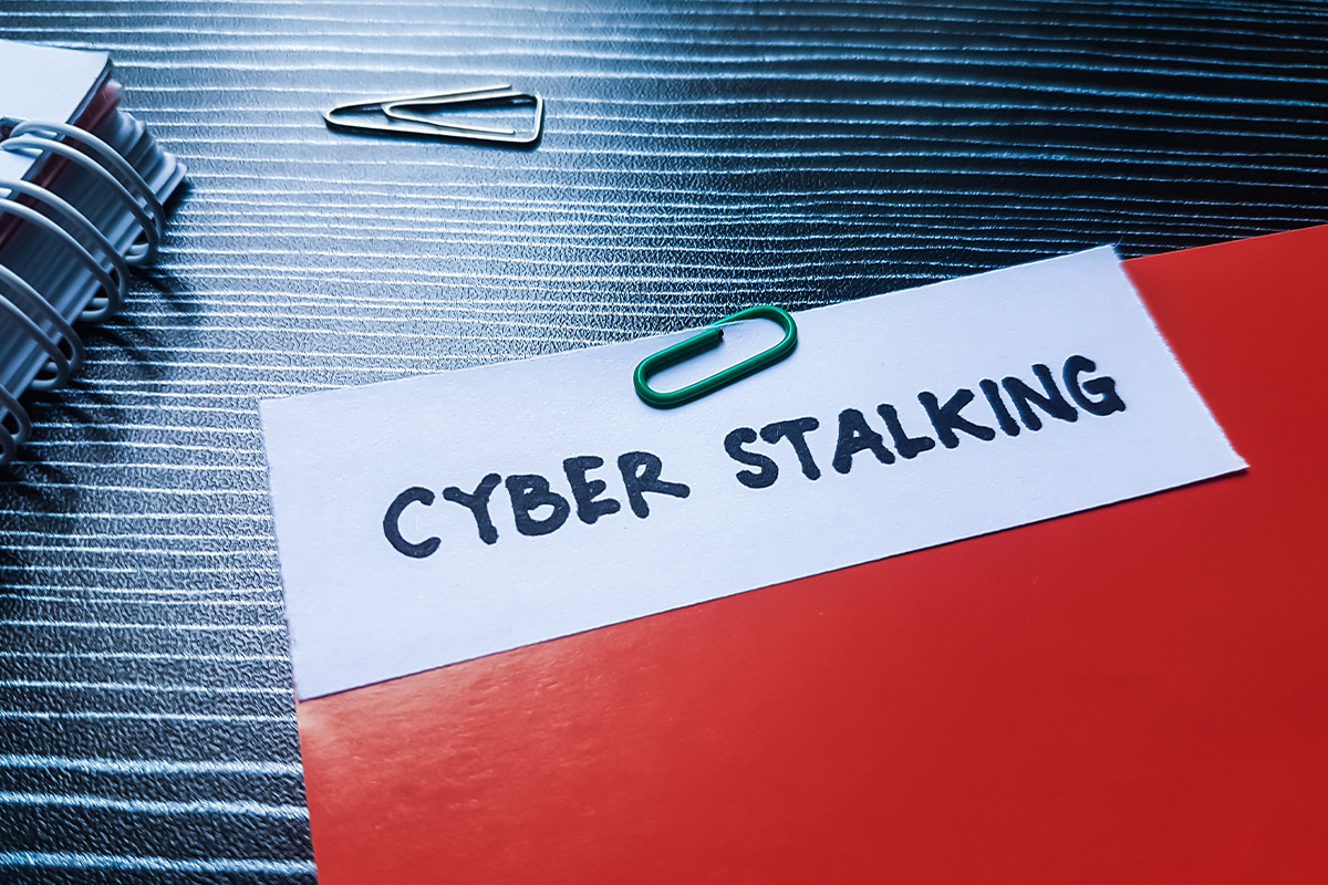 Visual representation of cyber stalking, part of Stalking Awareness Month, focusing on recognizing signs and ensuring safety.